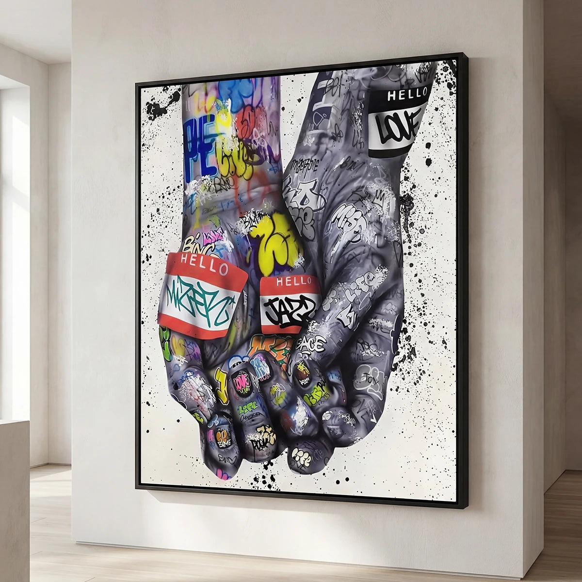 Tableau graffiti mains noir et blanc avec touches colorées