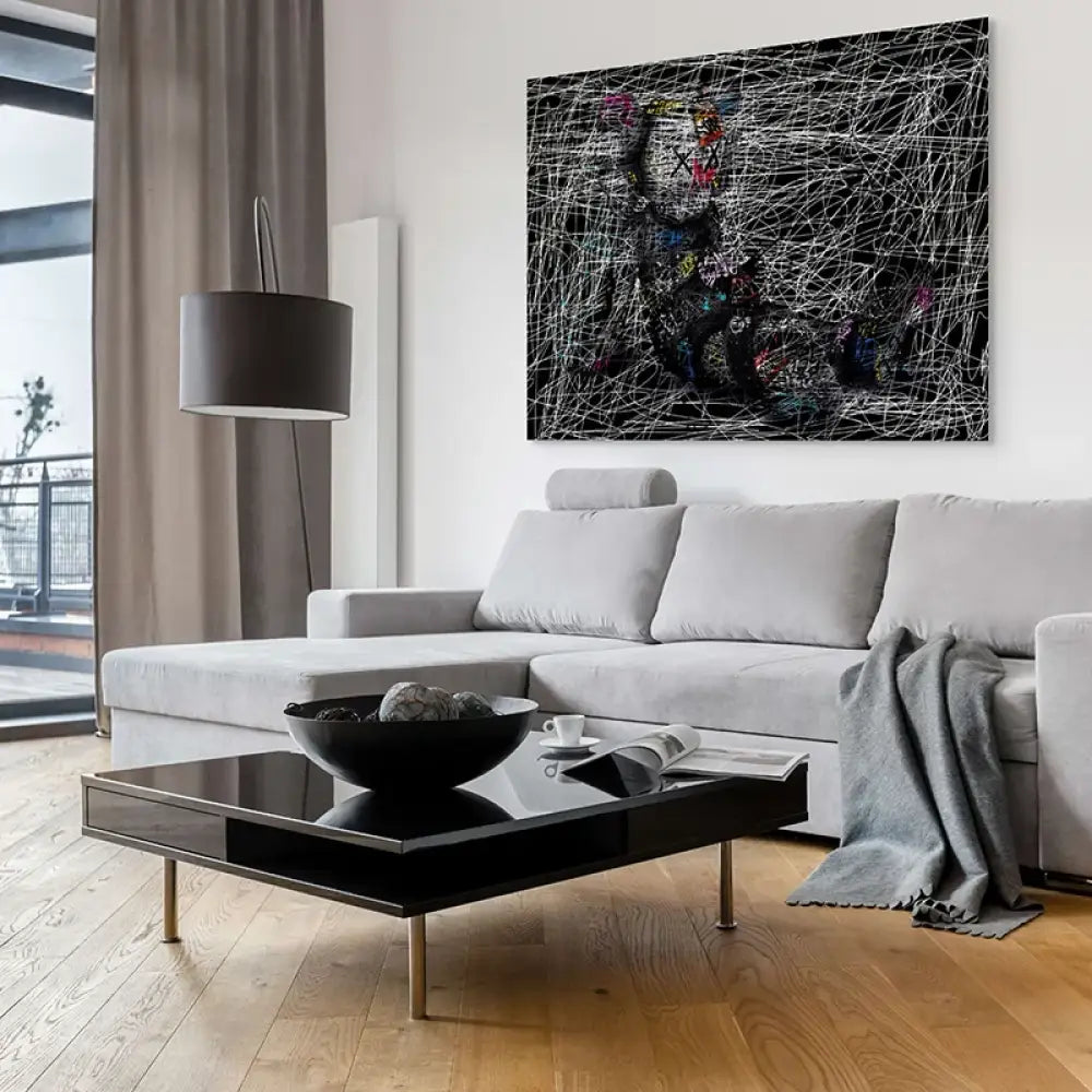 tableau kaws le dormeur de craie personnage assis lignes de craie sur fond noir