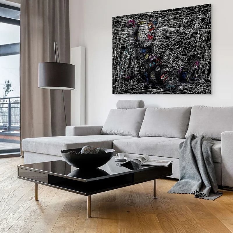 tableau kaws le dormeur de craie personnage assis lignes de craie sur fond noir