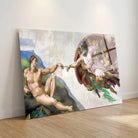 Tableau plexiglas La Création d’Adam effet brillant et profondeur sans fixation visible