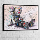 tableau kaws le rêveur assis avec cadre noir 